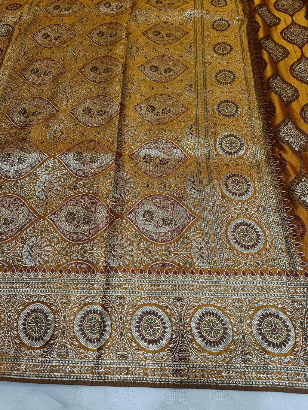 Mustard Yellow Banarasi Satin Silk Saree with Traditional Circular Zari Border