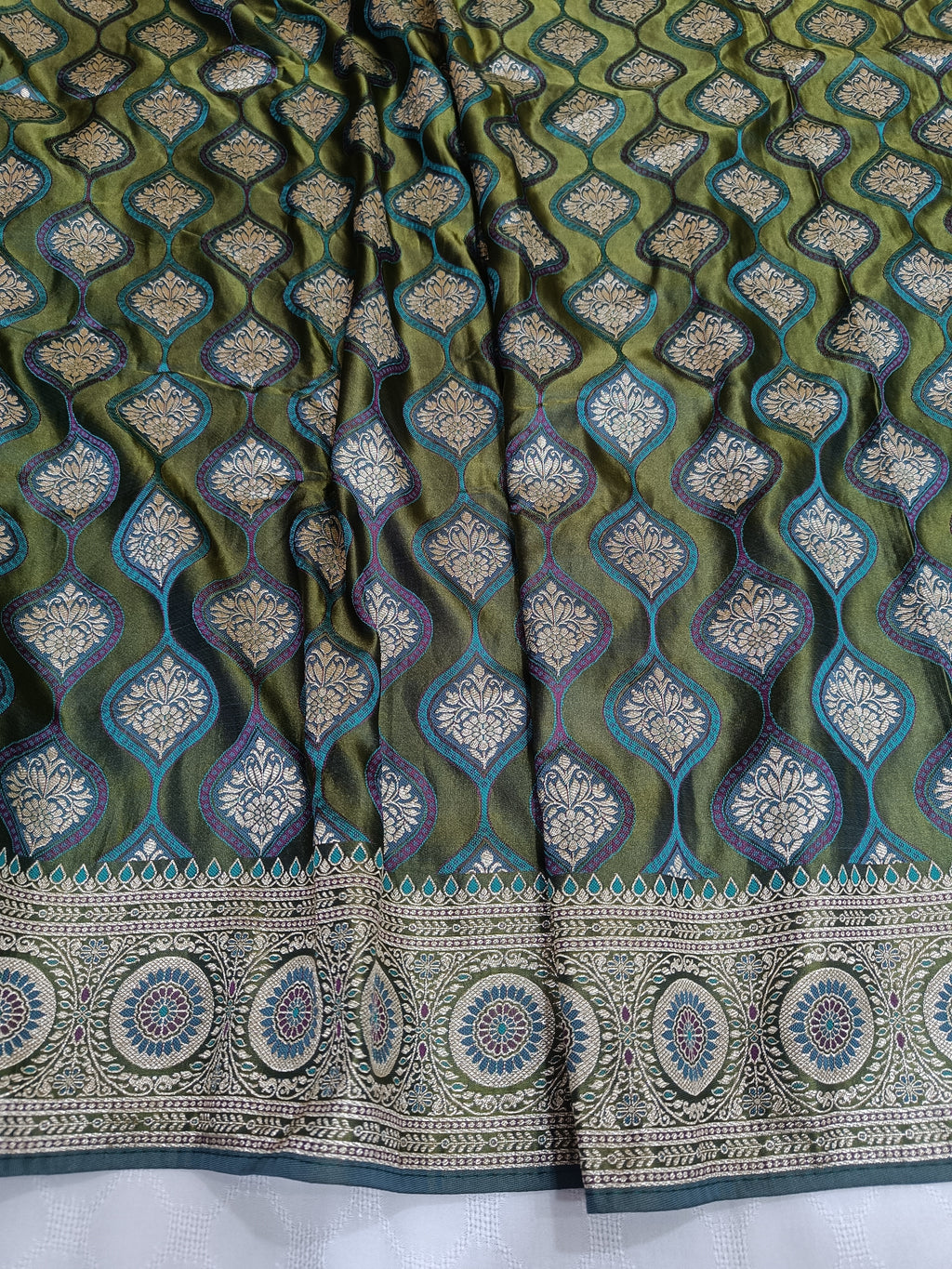 Olive Green Banarasi Satin Silk Saree with Artistic Zari Motifs