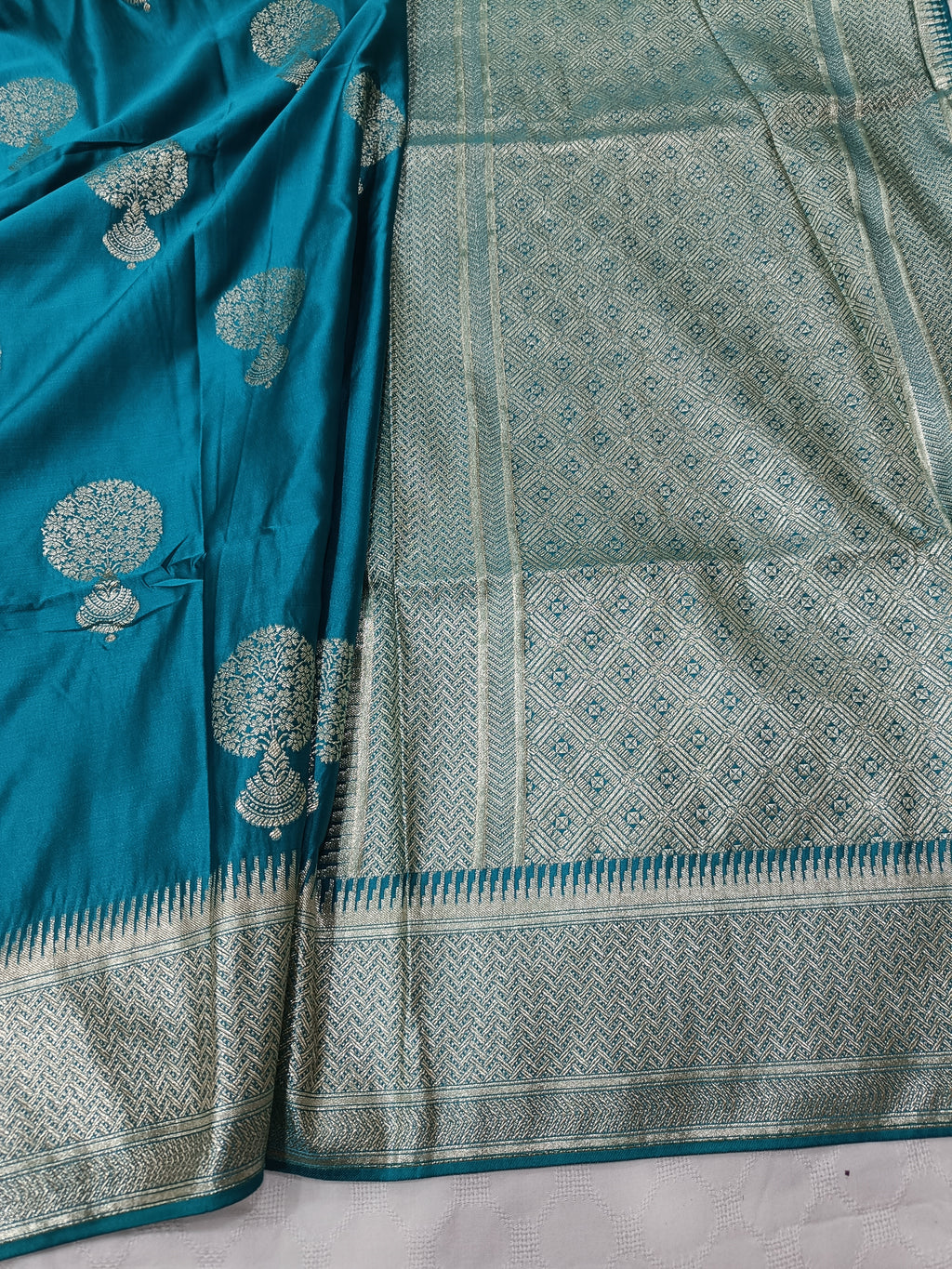 SP216 - Peacock Blue Tree Motif Banarasi Satin Silk Saree
