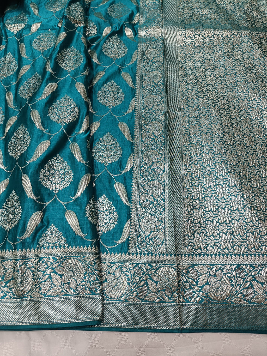 SP220 - Teal Blue Floral Vine Banarasi Satin Silk Saree